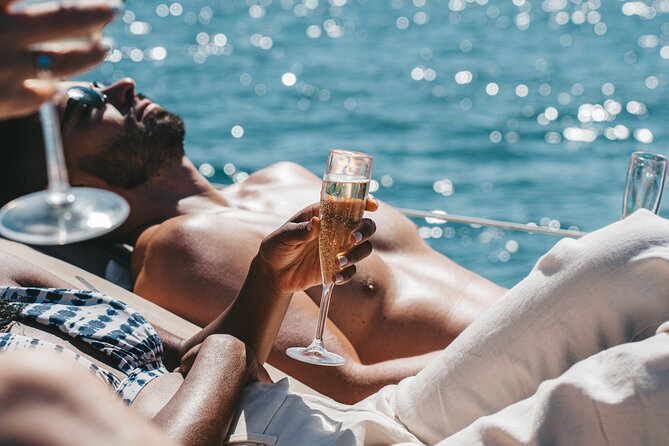 3 Hours Private Tour with Dives in Catamaran in Lisbon - Drinks, platters, and group celebrations