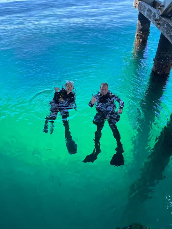 Busselton: Jetty Scuba Dive Tours with Underwater Sculptures - Entering the water at a 9m site
