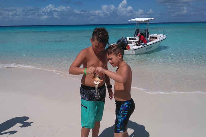 Gibbs Cay Stingray and Conch Dive Adventure - Conch salad, rum punch, and the beach setting